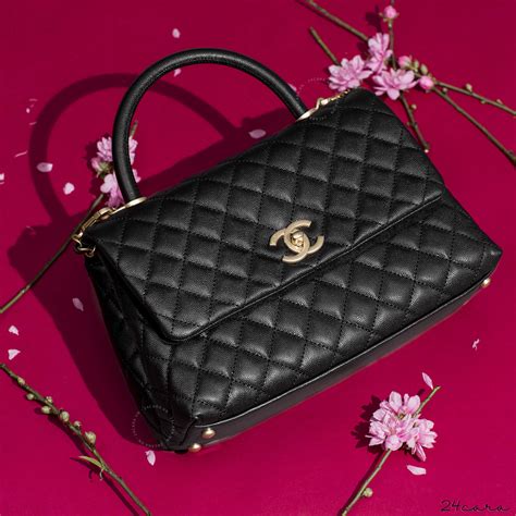 chanel coco flap bag with top handle|Coco Chanel bag price.